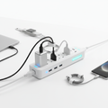 Smart power strip with USB ports on a desk